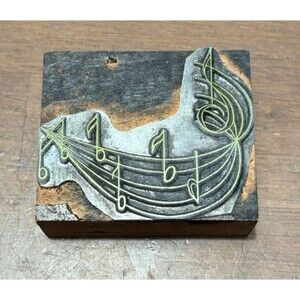 Vintage printer Printing Block Sheet Music Notes